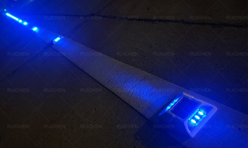 Blue Solar Road Stud On The Centerline Of The Road