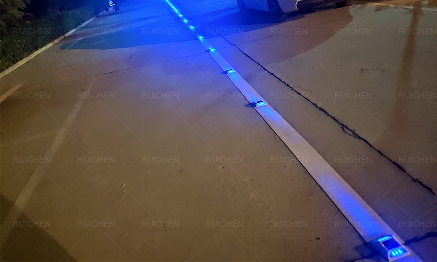 Blue Solar Road Stud On The Centerline Of The Road